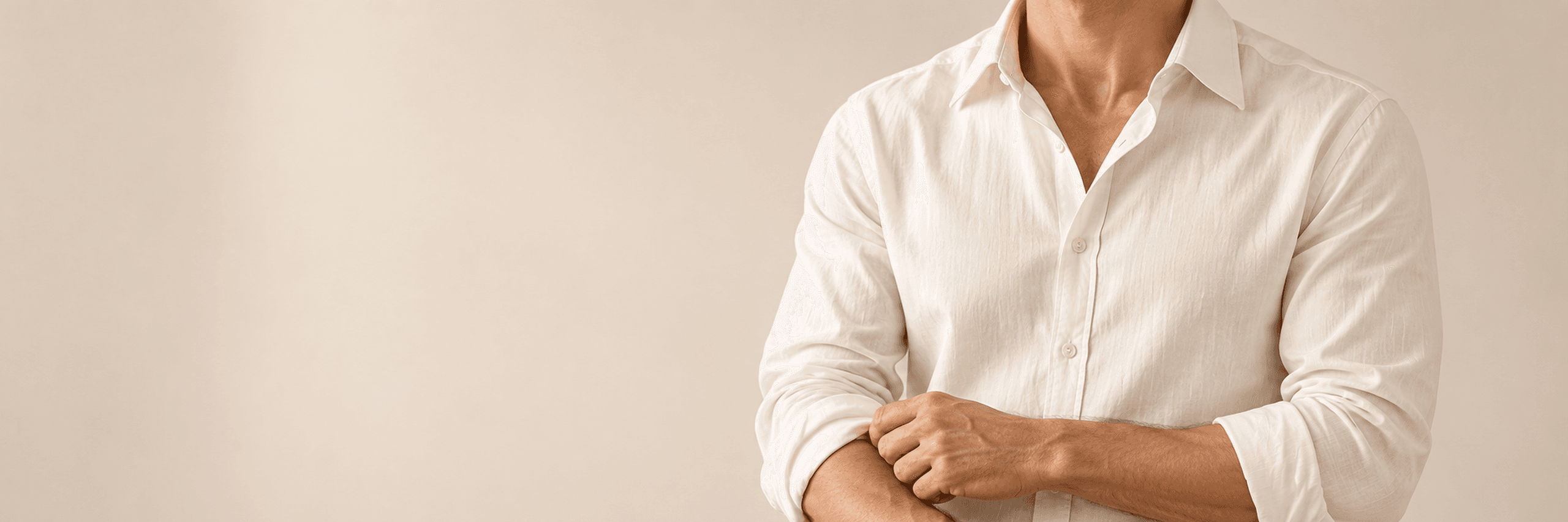 Model wearing a crisp white AEVRO shirt