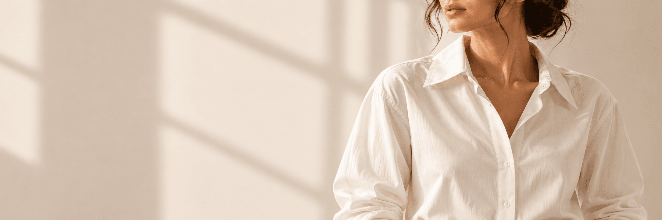 Model wearing a crisp white AEVRO shirt